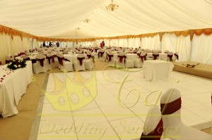 Large-marquee-with-lining-and-gold-swags